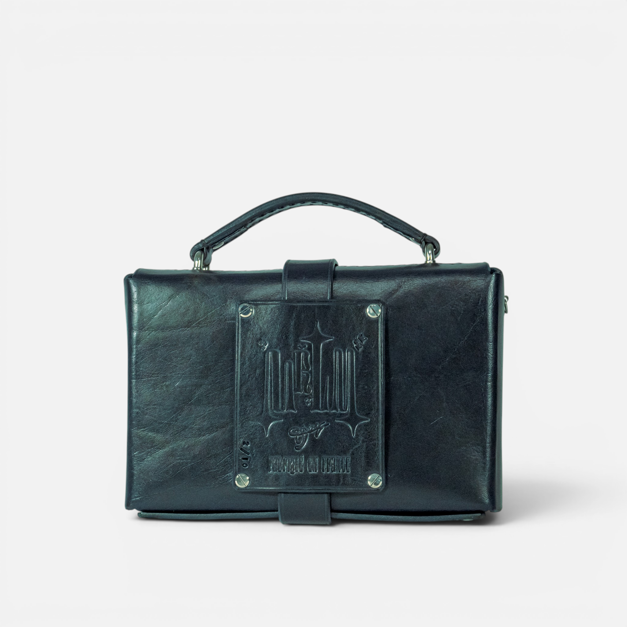 Sac DILI Bleu Marine en cuir pleine fleur, détail de la couture sellier